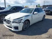 ✅ 2014 Infiniti Q50 Hybrid Sport • VIN: JN1AV7AR4EM700215 • Lot: 42156788. Wystawiony na IAAI z przebiegiem 137 501 mil. Bezpłatny archiwum sprzedaży aukcyjnych z USA i szczegółowy raport historii pojazdu na DreamBid. Zdjęcie 2.