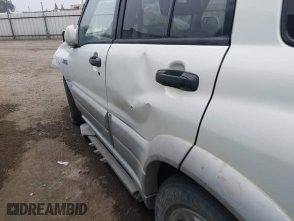 ✅ 2003 Suzuki Grand Vitara • VIN: JS3TE62VX34100454 • Lot: 43839370. Listed on IAAI with 198,777 mi. Free auction sales archive from the USA and detailed vehicle history report at DreamBid. Image 15.