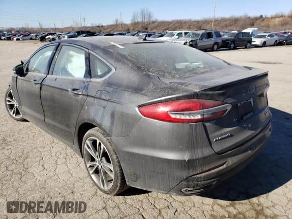 ✅ 2020 Ford Fusion Titanium • VIN: 3FA6P0D97LR117454 • Lot: 38784683. Wystawiony na Copart z przebiegiem Nie podano. Bezpłatny archiwum sprzedaży aukcyjnych z USA i szczegółowy raport historii pojazdu na DreamBid. Zdjęcie 2.