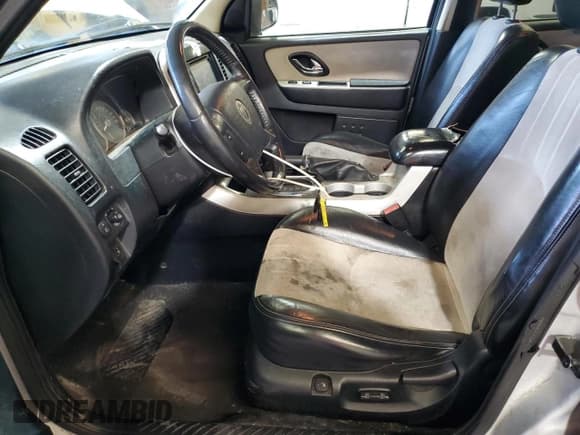 ✅ 2007 Mercury Mariner Premier • VIN: 4M2CU97147KJ02737 • Lot: 91291695. Wystawiony na Copart z przebiegiem 187 727 mil. Bezpłatny archiwum sprzedaży aukcyjnych z USA i szczegółowy raport historii pojazdu na DreamBid. Zdjęcie 7.