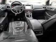 ✅ 2018 Ford Edge Titanium • VIN: 2FMPK4K81JBB49726 • Lot: 86066075. Wystawiony na Copart z przebiegiem 116 470 mil. Bezpłatny archiwum sprzedaży aukcyjnych z USA i szczegółowy raport historii pojazdu na DreamBid. Zdjęcie 8.