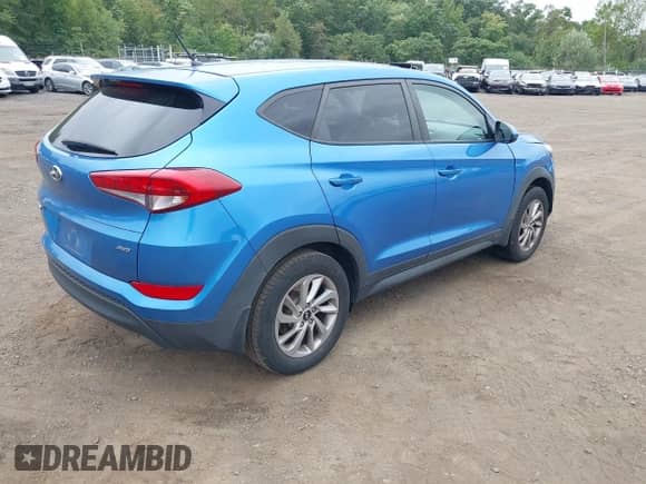 2018 Hyundai Tucson SE z VIN KM8J2CA42JU652027, wystawiony jako IAAI lot #43194087 z przebiegiem 105 824 mil mil oraz . Historia ofert i sprzedaży dostępna na DreamBid. Obrazek 4.