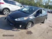 ✅ 2014 Ford Fiesta Titanium • VIN: 3FADP4FJ0EM200164 • Lot: 43450345. Wystawiony na IAAI z przebiegiem 107 553 mil. Bezpłatny archiwum sprzedaży aukcyjnych z USA i szczegółowy raport historii pojazdu na DreamBid. Zdjęcie 17.