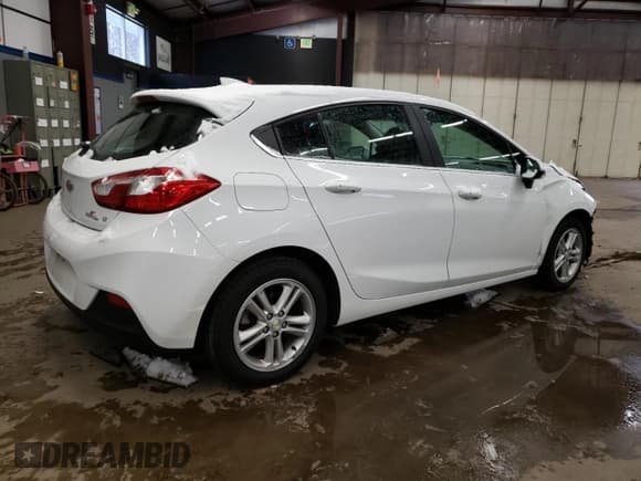 ✅ 2017 Chevrolet Cruze LT • VIN: 3G1BE6SM6HS590196 • Lot: 36762483. Listed on Copart with 100,275 mi. Free auction sales archive from the USA and detailed vehicle history report at DreamBid. Image 3.