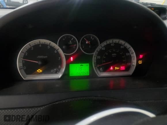 2010 Chevrolet Aveo 1LT z VIN KL1TD5DE8AB124647, wystawiony jako Copart lot #84390584 z przebiegiem 142 059 mil mil oraz Szkoda całkowita • Salvage title. Historia ofert i sprzedaży dostępna na DreamBid. Obrazek 9.