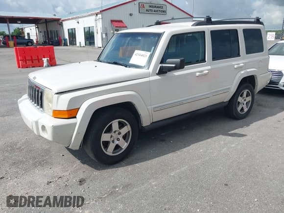 ✅ 2010 Jeep Commander Sport • VIN: 1J4RH4GK4AC140982 • Lot: 42344821. Listed on IAAI with 179,476 mi. Free auction sales archive from the USA and detailed vehicle history report at DreamBid. Image 2.