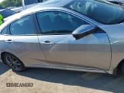 ✅ 2021 Honda Civic EX-L • VIN: 19XFC1F76ME011934 • Lot: 42637103. Listed on IAAI with 57,299 mi. Free auction sales archive from the USA and detailed vehicle history report at DreamBid. Image 14.