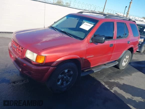 ✅ 1999 Isuzu Rodeo S • VIN: 4S2CK58W3X4307201 • Lot: 41884901. Listed on IAAI with 236,970 mi. Free auction sales archive from the USA and detailed vehicle history report at DreamBid. Image 2.