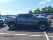 ✅ 2022 Toyota Tacoma SR • VIN: 3TMCZ5AN9NM519241 • Lot: 42941548. Listed on IAAI with 80,252 mi. Free auction sales archive from the USA and detailed vehicle history report at DreamBid. Image 13.