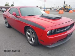 ✅ 2013 Dodge Challenger R/T • VIN: 2C3CDYBT5DH536813 • Lot: 42181604. Listed on IAAI with 101,886 mi. Free auction sales archive from the USA and detailed vehicle history report at DreamBid. Image 1.