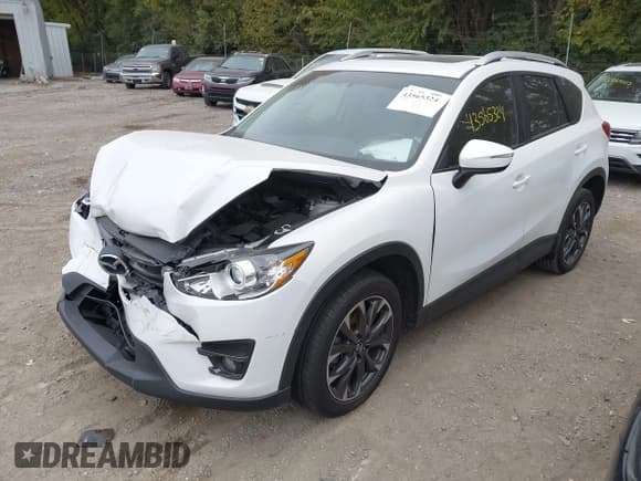 ✅ 2016 Mazda CX-5 Grand Touring • VIN: JM3KE4DY6G0873688 • Lot: 43565324. Wystawiony na IAAI z przebiegiem 80 920 mil. Bezpłatny archiwum sprzedaży aukcyjnych z USA i szczegółowy raport historii pojazdu na DreamBid. Zdjęcie 2.