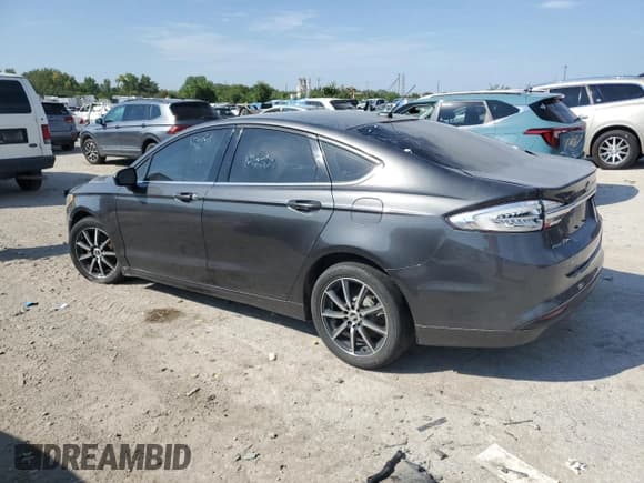✅ 2018 Ford Fusion S • VIN: 3FA6P0UU6JR189053 • Lot: 80568005. Listed on Copart with 101,571 mi. Free auction sales archive from the USA and detailed vehicle history report at DreamBid. Image 2.
