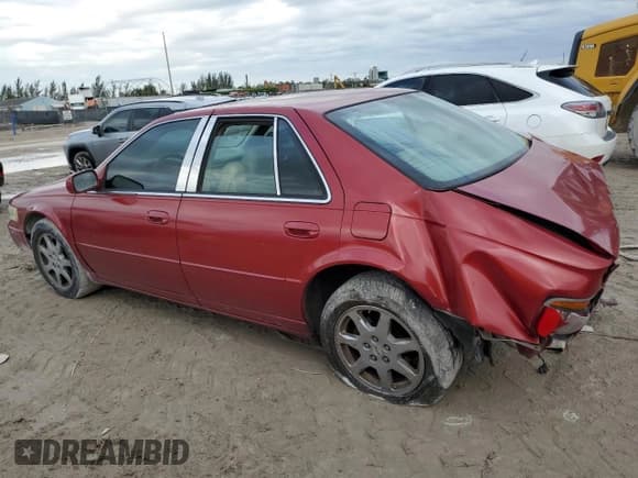 ✅ 2002 Cadillac Seville Touring STS • VIN: 1G6KY54902U132357 • Lot: 42008795. Listed on Copart with 111,014 mi. Free auction sales archive from the USA and detailed vehicle history report at DreamBid. Image 2.