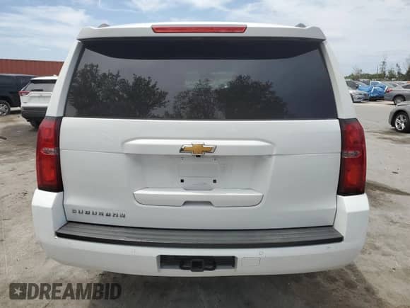 2018 Chevrolet Suburban LS с VIN 1GNSCGKC6JR379977, выставлен на аукционе Copart как лот 54351685 с пробегом 138 574 миль миль и Списание • Salvage title. История ставок и продаж доступна на DreamBid. Изображение 6.