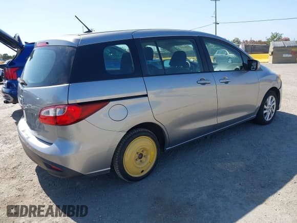 ✅ 2012 Mazda 5 Sport • VIN: JM1CW2BL9C0117627 • Lot: 42403991. Listed on IAAI with 124,239 mi. Free auction sales archive from the USA and detailed vehicle history report at DreamBid. Image 4.