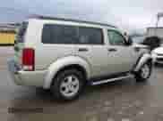 2008 Dodge Nitro SXT с VIN 1D8GT28K18W273997, выставлен на аукционе Copart как лот 82488214 с пробегом 185 077 миль миль и Списание • Salvage title. История ставок и продаж доступна на DreamBid. Изображение 3.