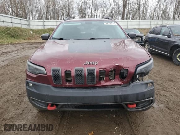 ✅ 2019 Jeep Cherokee Trailhawk Elite • VIN: 1C4PJMBX0KD431818 • Лот: 92196505. Опубликован ранее на Copart с пробегом 232 865 миль. Бесплатный доступ к архиву аукционных продаж из США и подробный отчёт об истории автомобиля на DreamBid. Изображение 5.