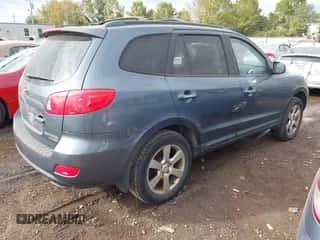 2009 Hyundai Santa Fe Limited z VIN 5NMSH73E89H266557, wystawiony jako IAAI lot #43390079 z przebiegiem 187 064 mil mil oraz . Historia ofert i sprzedaży dostępna na DreamBid. Obrazek 4.