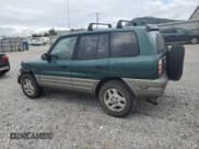 ✅ 2000 Toyota RAV4 • VIN: JT3HP10V9Y0230667 • Лот: 82100765. Опубликован ранее на Copart с пробегом 206 007 миль. Бесплатный доступ к архиву аукционных продаж из США и подробный отчёт об истории автомобиля на DreamBid. Изображение 2.