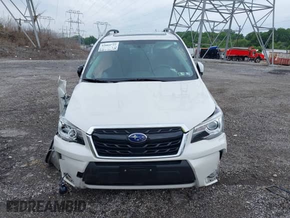 2018 Subaru Forester Touring z VIN JF2SJGWC3JH607000, wystawiony jako IAAI lot #42664722 z przebiegiem 30 857 mil mil oraz . Historia ofert i sprzedaży dostępna na DreamBid. Obrazek 12.