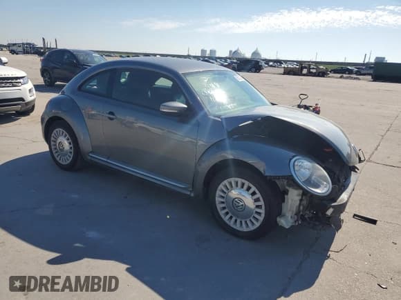 ✅ 2014 Volkswagen Beetle 1.8T • VIN: 3VWJ07ATXEM653653 • Lot: 85013035. Listed on Copart with Not provided. Free auction sales archive from the USA and detailed vehicle history report at DreamBid. Image 4.