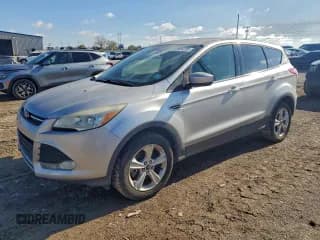 ✅ 2016 Ford Escape SE • VIN: 1FMCU9GX7GUA85488 • Lot: 93985255. Listed on Copart with 136,483 mi. Free auction sales archive from the USA and detailed vehicle history report at DreamBid. Image 1.