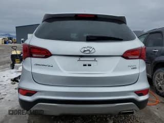 ✅ 2018 Hyundai Santa Fe 2.4L • VIN: 5XYZUDLB5JG519606 • Лот: 71821252. Опубликован ранее на Copart с пробегом 59 061 миль. Бесплатный доступ к архиву аукционных продаж из США и подробный отчёт об истории автомобиля на DreamBid. Изображение 6.