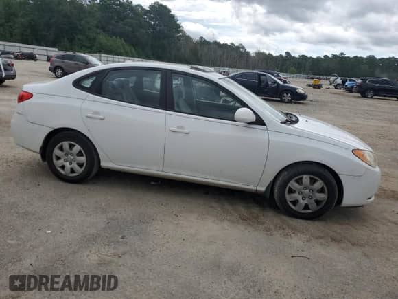 2007 Hyundai Elantra GLS with VIN KMHDU46D67U252356, listed as a Copart auction lot 69018295 with 165,279 mi miles and Clean title. Bid and sale history available at DreamBid. Image 4.