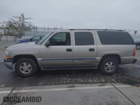 ✅ 2003 Chevrolet Suburban LS • VIN: 3GNEC16T53G301634 • Лот: 42406958. Опубликован ранее на IAAI с пробегом 255 719 миль. Бесплатный доступ к архиву аукционных продаж из США и подробный отчёт об истории автомобиля на DreamBid. Изображение 14.