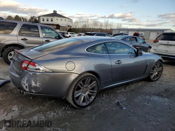 ✅ 2011 Jaguar XK XKR • VIN: SAJWA4DC2BMB43759 • Lot: 82405684. Listed on Copart with 76,858 mi. Free auction sales archive from the USA and detailed vehicle history report at DreamBid. Image 3.