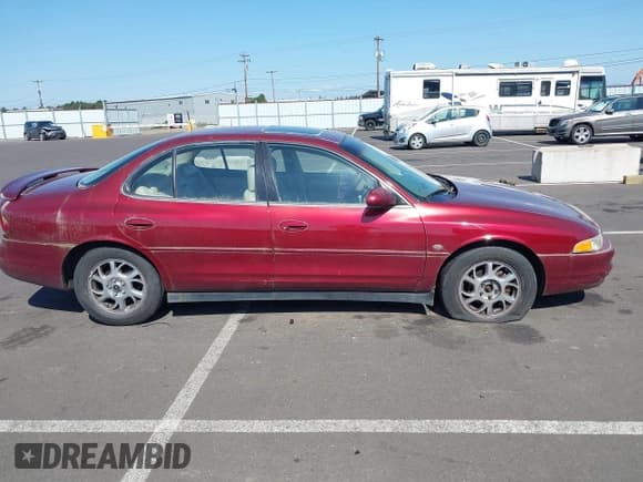 ✅ 2001 Oldsmobile Intrigue GLS • VIN: 1G3WX52H81F140236 • Lot: 42356879. Wystawiony na IAAI z przebiegiem Nie podano. Bezpłatny archiwum sprzedaży aukcyjnych z USA i szczegółowy raport historii pojazdu na DreamBid. Zdjęcie 13.