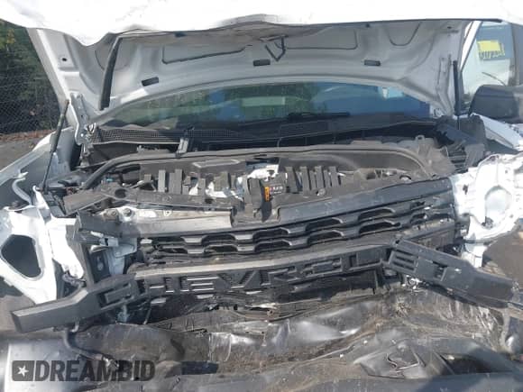 2021 Chevrolet Silverado 1500 Work Truck z VIN 1GCRWAEH4MZ407220, wystawiony jako IAAI lot #43265588 z przebiegiem 104 655 mil mil oraz . Historia ofert i sprzedaży dostępna na DreamBid. Obrazek 10.