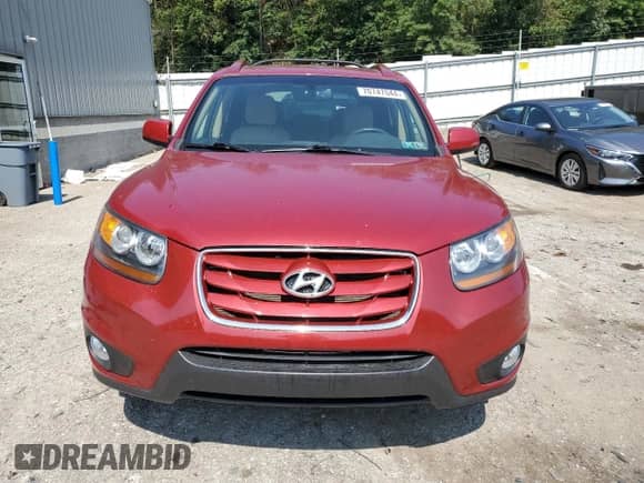 2011 Hyundai Santa Fe Limited с VIN 5XYZKDAG7BG064084, выставлен на аукционе Copart как лот 70747044 с пробегом 105 053 миль миль и Списание • Salvage title. История ставок и продаж доступна на DreamBid. Изображение 5.