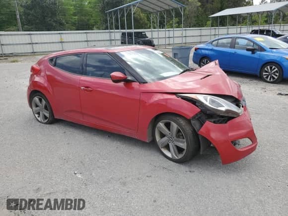2013 Hyundai Veloster w/Gray Int z VIN KMHTC6AD8DU104366, wystawiony jako Copart lot #52378865 z przebiegiem Nie podano mil oraz Szkoda całkowita • Salvage title. Historia ofert i sprzedaży dostępna na DreamBid. Obrazek 4.