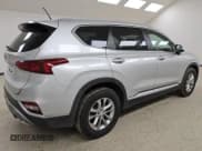✅ 2019 Hyundai Santa Fe SE • VIN: 5NMS23AD4KH020406 • Лот: 56236005. Опубликован ранее на Copart с пробегом 107 972 миль. Бесплатный доступ к архиву аукционных продаж из США и подробный отчёт об истории автомобиля на DreamBid. Изображение 3.