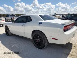 ✅ 2012 Dodge Challenger SRT-8 392 • VIN: 2C3CDYCJ7CH275275 • Lot: 77423314. Wystawiony na Copart z przebiegiem 71 896 mil. Bezpłatny archiwum sprzedaży aukcyjnych z USA i szczegółowy raport historii pojazdu na DreamBid. Zdjęcie 2.