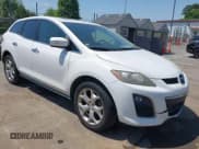 ✅ 2010 Mazda CX-7 Touring • VIN: JM3ER2W31A0351940 • Lot: 42082089. Listed on IAAI with 202,298 mi. Free auction sales archive from the USA and detailed vehicle history report at DreamBid. Image 1.