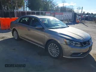 ✅ 2017 Volkswagen Passat SE • VIN: 1VWBT7A35HC014209 • Lot: 43729001. Listed on IAAI with 141,561 mi. Free auction sales archive from the USA and detailed vehicle history report at DreamBid. Image 1.