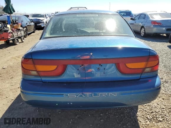 ✅ 2002 Saturn SL • VIN: 1G8ZK54772Z130842 • Лот: 84471205. Опубликован ранее на Copart с пробегом 65 826 миль. Бесплатный доступ к архиву аукционных продаж из США и подробный отчёт об истории автомобиля на DreamBid. Изображение 6.