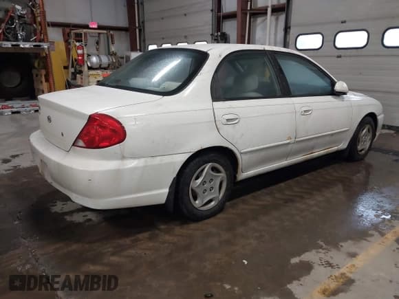 ✅ 2003 Kia Spectra • VIN: KNAFB121235300577 • Лот: 43825776. Опубликован ранее на IAAI с пробегом 132 271 миль. Бесплатный доступ к архиву аукционных продаж из США и подробный отчёт об истории автомобиля на DreamBid. Изображение 4.