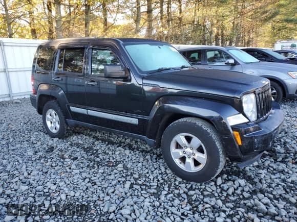 ✅ 2010 Jeep Liberty Sport • VIN: 1J4PN2GK1AW105982 • Lot: 82721535. Listed on Copart with 122,977 mi. Free auction sales archive from the USA and detailed vehicle history report at DreamBid. Image 4.