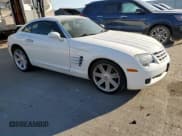 ✅ 2004 Chrysler Crossfire • VIN: 1C3AN69L94X002966 • Lot: 76795154. Listed on Copart with 14,235 mi. Free auction sales archive from the USA and detailed vehicle history report at DreamBid. Image 4.