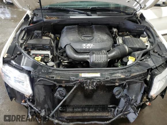 ✅ 2012 Jeep Grand Cherokee Overland • VIN: 1C4RJFCG7CC324310 • Lot: 84262345. Listed on Copart with 155,354 mi. Free auction sales archive from the USA and detailed vehicle history report at DreamBid. Image 12.