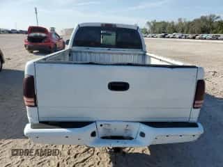 1998 Dodge Dakota SLT z VIN 1B7FL26X0WS729260, wystawiony jako Copart lot #77902074 z przebiegiem Nie podano mil oraz Nie do naprawy • Non repairable. Historia ofert i sprzedaży dostępna na DreamBid. Obrazek 6.