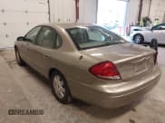 ✅ 2004 Ford Taurus SEL • VIN: 1FAFP56S04A135092 • Lot: 43803317. Listed on IAAI with 84,891 mi. Free auction sales archive from the USA and detailed vehicle history report at DreamBid. Image 3.