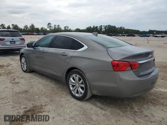 ✅ 2018 Chevrolet Impala LT • VIN: 2G1105S35J9132440 • Лот: 79299114. Опубликован ранее на Copart с пробегом 130 869 миль. Бесплатный доступ к архиву аукционных продаж из США и подробный отчёт об истории автомобиля на DreamBid. Изображение 2.