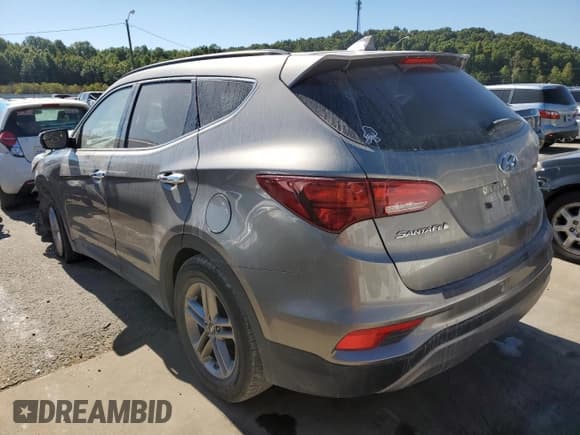 ✅ 2018 Hyundai Santa Fe 2.4L • VIN: 5NMZUDLB5JH073608 • Лот: 61243292. Опубликован ранее на Copart с пробегом 43 386 миль. Бесплатный доступ к архиву аукционных продаж из США и подробный отчёт об истории автомобиля на DreamBid. Изображение 3.
