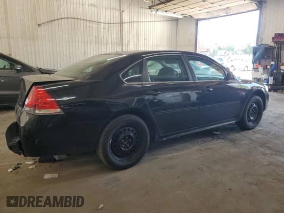 2013 Chevrolet Impala Police с VIN 2G1WD5E3XD1258334, выставлен на аукционе Copart как лот 61849625 с пробегом 99 903 миль миль и Списание • Salvage title. История ставок и продаж доступна на DreamBid. Изображение 3.