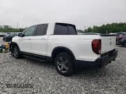 ✅ 2022 Honda Ridgeline RTL • VIN: 5FPYK3F57NB001597 • Lot: 60258535. Listed on Copart with 8,542 mi. Free auction sales archive from the USA and detailed vehicle history report at DreamBid. Image 2.