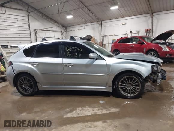 ✅ 2013 Subaru WRX WRX • VIN: JF1GR7E61DG853648 • Lot: 41689799. Wystawiony na IAAI z przebiegiem 124 193 mil. Bezpłatny archiwum sprzedaży aukcyjnych z USA i szczegółowy raport historii pojazdu na DreamBid. Zdjęcie 13.